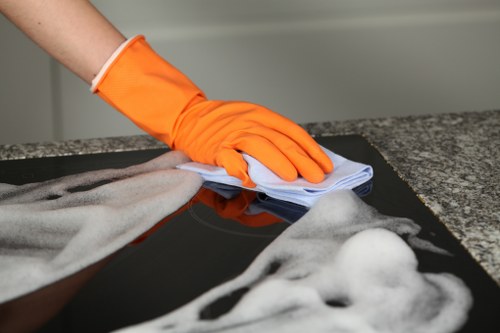 Kentishtown office cleaners sanitising shared work surfaces