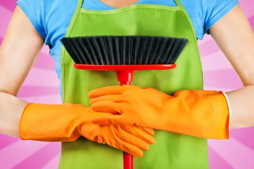 Professional cleaning team following health and safety standards